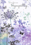 This sympathy card reads like a soft-spoken poem in paint, capturing the same sense of understated beauty you might notice while slipping away from Kilburn High Road into a quieter side street at dusk. A series of airy wildflower silhouettes stretch upwards, their slender stems and delicate, umbrella-shaped heads drawn in muted shades of lavender, indigo, and smoky blue. The artist has kept the lines fine and graceful, allowing negative space to weave between the blooms so that they almost seem to float against the background. Subtle washes of pale purple, soft blue-grey, and silvery green blur together behind the flowers, giving the impression of a quiet meadow or verge, gently fading into the distance like a half-remembered landscape near Kilburn Grange Park. Scattered around the blooms, a few butterflies hover with almost transparent wings, their outlines faintly traced in the same cool palette. They evoke a sense of transformation and continuing presence, the way memories linger even when a loved one is no longer physically beside us. The overall colour scheme is cool yet comforting, designed to soothe the eye and ease the heart rather than draw attention with bright contrast. Written across this calming scene in elegant script are the words of sympathy, placed thoughtfully so as not to overpower the imagery. From the vantage point of Florist Kilburn, where we often help families choose the right combination of condolence flowers and cards, this design feels like a respectful, gentle embrace. It speaks softly but clearly, offering solace wrapped in nature's own symbols of tenderness, endurance, and quiet hope.